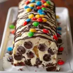M&M's Chocolate Chip Cookie Dough Roll topped with colorful chocolate candies
