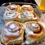 Deliciously baked timeless cinnamon rolls topped with icing