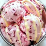 Delicious bowl of velvet white chocolate ice cream topped with chocolate shavings