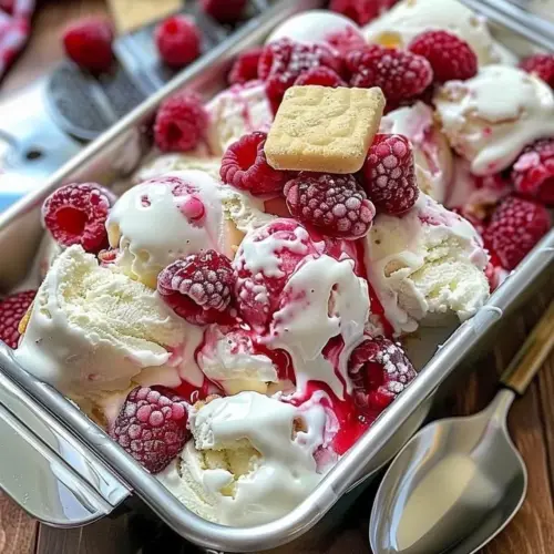 Delicious Raspberry Shortcake Ice Cream served in a bowl